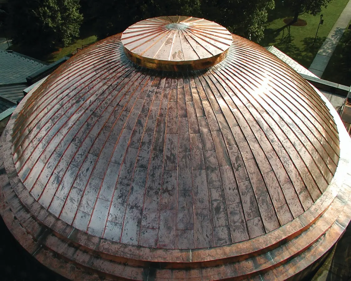 Craftsman Roofing crew installing a new roof in Melville